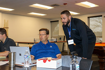 Marcus Sweitzer, PennAir Technical Sales Professional, left, gains hands-on experience with Festo online configuration tools assisted by Jared Mann, Distribution Development Specialist, Festo, during a training session at PennAir.