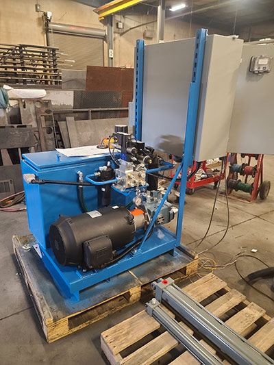 The rebuilt hydraulic power unit was more compact, as it eliminated a heat exchanger and featured a smaller motor and a new hydraulic pump, among other things. Image courtesy of Turner Hydraulics/TASCorp..