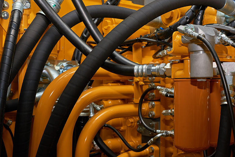 Hydraulic fluid and hose compatibility AdobeStock_295050958