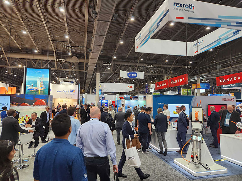Attendees walk the show floor at OTC Offshore Technology Conference 2023.