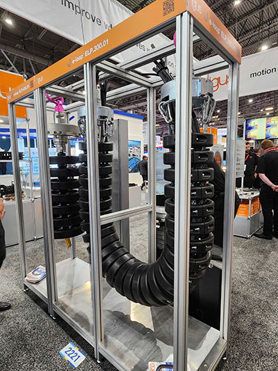 Above: igus' e-loop modular e-chain cable carrier, on display in 2023 at OTC, is a finalist for ASME's BMEA Award.