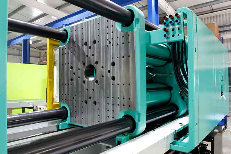 Figure. 2. Injection molding machines rely on numerous cylinders to clamp and eject parts.