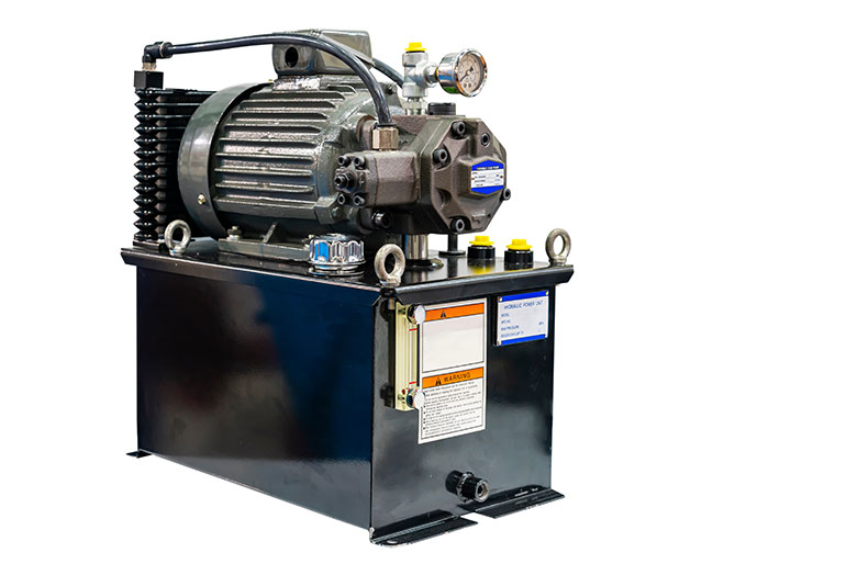 Tank top mounted hydraulic pump design