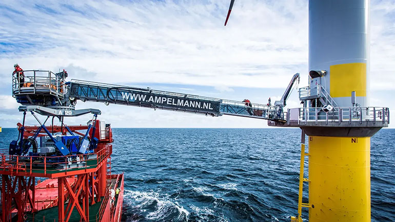 Here is an offshore access system (i.e., gangway) from Ampelmann, underpinned by a Moog 6 DOF motion base using electrohydrostatic actuation. The gangway allows personnel to transfer from a ship to, for example, an offshore wind turbine in seas up to 3m Hs. Because of its full motion compensation, there is no movement in the gangway during operation, resulting in a safe way to transfer workers. The gangway can transfer 20 people in under five minutes from a vessel to a fixed or floating object. Also attached a close-up photo of the Moog 6 DOF.