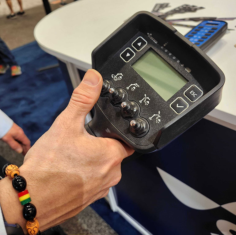 Scanreco's OneGrip pistol grip transmitter allows for easy one-handed operation, helping solo operators with safe machine operation.