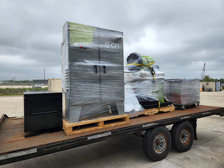 Logistics was critical in the project. CFI had to ship containers, move cranes, and transport equipment up a narrow mountain road that could become barely passable due to weather.