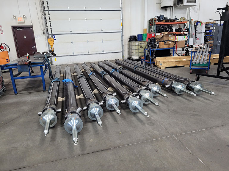Aggressive Hydraulics manufactured eight custom cylinders. Each cylinder measured approximately 20 ft in length, weighed about 2,700 lb, and featured an 8-in. bore, a 5.5-in. rod, and a 174-in. stroke.