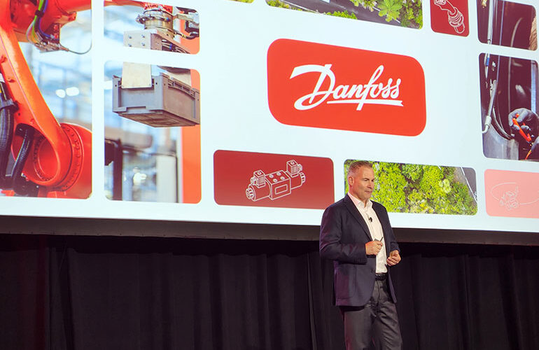 Daniel Winter, president of Danfoss Power Solutions, opens the presentations to the nearly 1,000 attendees at its Danfoss Distributor Meeting in Phoenix earlier this month.