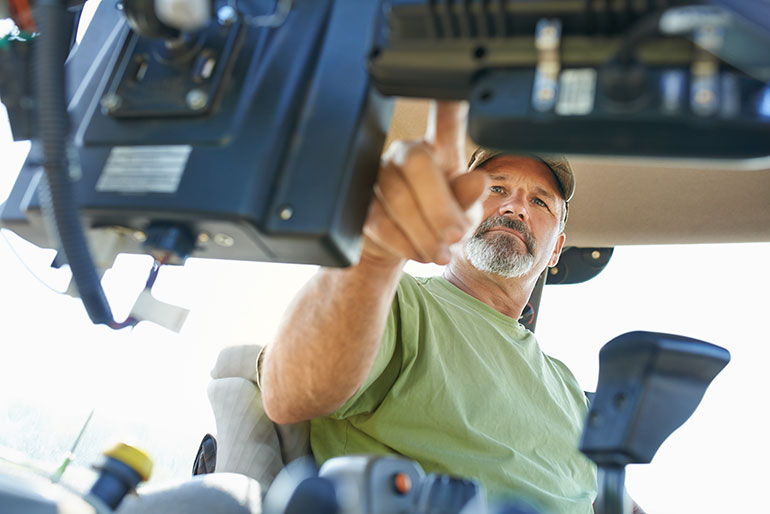 Agricultural machinery users have pushed back against overly electronic interiors to maintain some level of buttons, gears and levers.